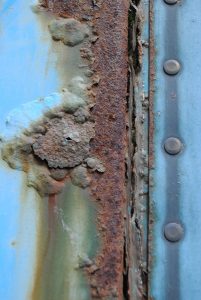 rust-treatment-tips-for-corroded-garage-door-parts-201x300